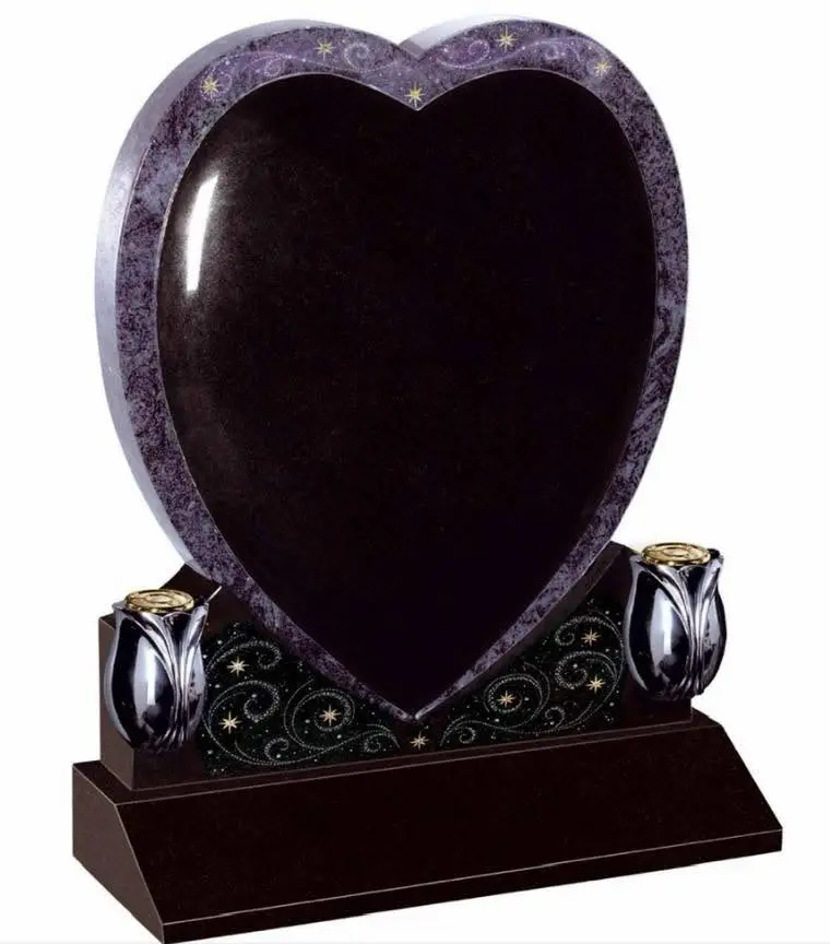 Completed heart-shaped showroom headstone in Jet Black and Bahama Blue granite